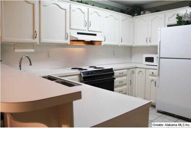 KITCHEN WITH DOUBLE STAINLESS STEEL SINK...