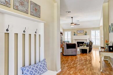 View walking into the front door. To the right is the dining room.