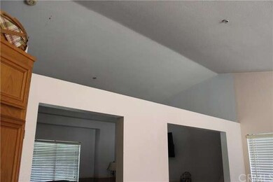 High ceiling between living room and family room.