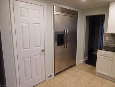 Built in Refrigerator and pantry.