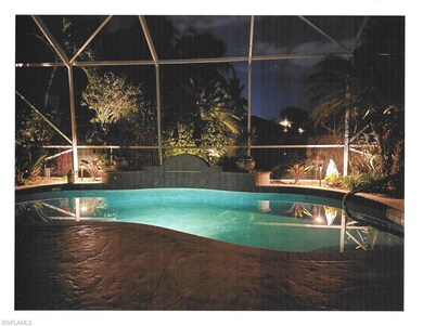 View of pool at twilight