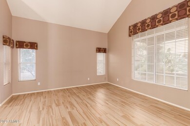 Large picture windows let in light.
