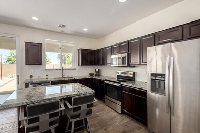 Breakfast Bar Overlooks Backyard Oasis!