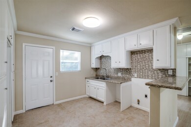 9906 Lonallen St, Houston, TX 77088 - photo 4