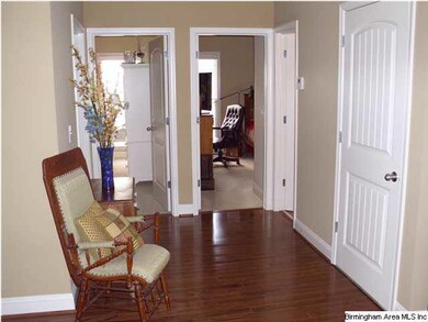 LARGE OPEN FOYER WITH HARDWOODS
