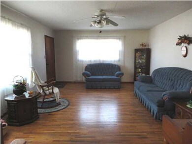 HUGE living room, well lighted and wonderful Hardw