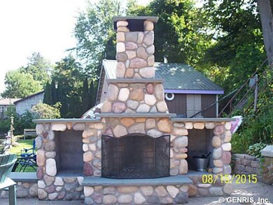Patio. Stone fireplace built by Roy White Masonry 