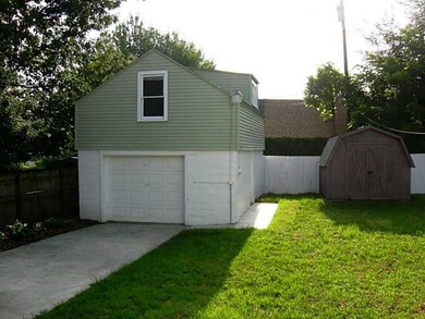 Parking Lot/Garage. The detached garage holds 1 ca