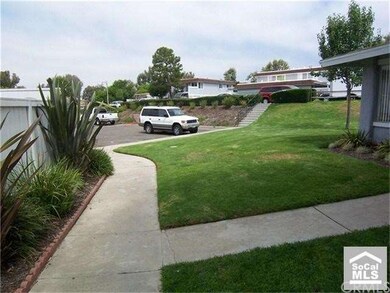 Just steps down walkway to assigned parking space