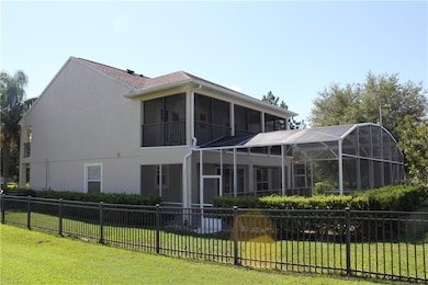 north side view of property with metal fence and 2