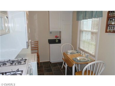 Breakfast Nook - Lovely breakfast nook to enjoy your meals.  Notice the cabinetry and ceramic floor tile.