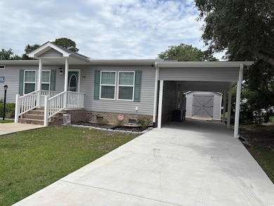 View of front of home featuring crawl space, a fro