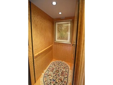 Inside of the elevator -- very large for an in-hom