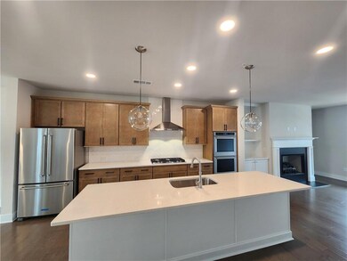 Upgraded stained cabinets and quartz counters