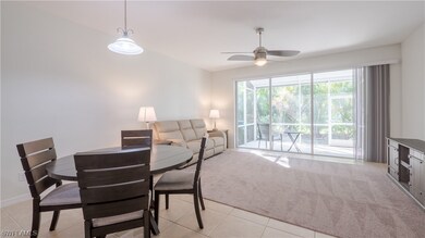 Dining & living rooms and the view of the lovely enclosed, south facing covered lanai.