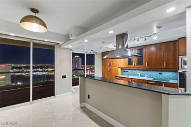 Kitchen featuring island range hood, stainless ste