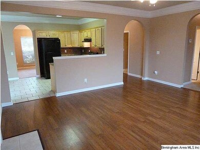 Open floor plan.  Notice the arched doorways