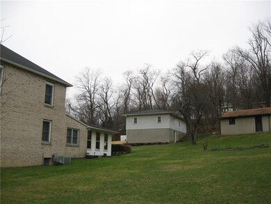 Side of house and garage