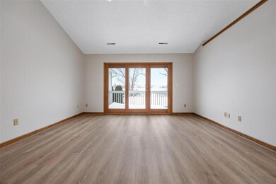 LR with French doors to deck.