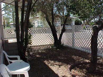 The side yard at front door