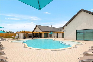 Community pool with a patio area