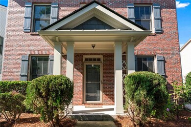 Entrance to property with brick siding