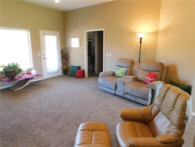 Another view of the living room.  Exterior door le