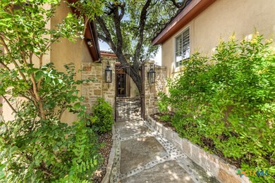 GATED ENTRY BETWEEN GARAGE AND CASITA