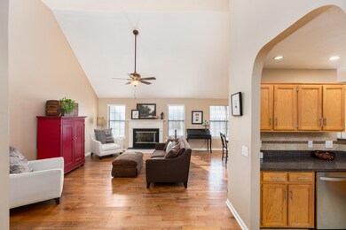 Welcome home!! What a view right to the back of the home with a wall of windows bringing in natural light.