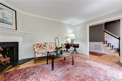 Alternate view of formal living room, looking into foyer.  Wide doorways allow for great flow - or add a pair of french doors and you've got a perfect first floor office!