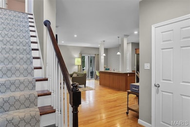 Enter into your separate foyer where you can see all the way through the house