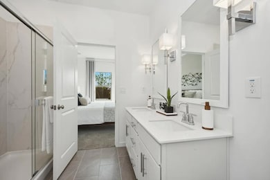 Primary bath with chrome fixtures
