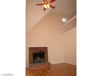 Living Room - The living room features a cozy bric