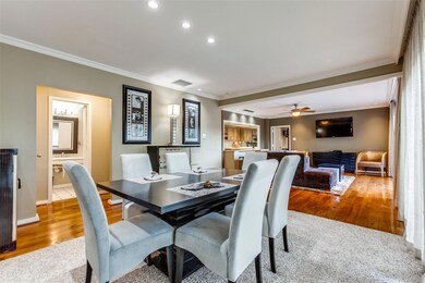 A full bath is located just beyond the dining area