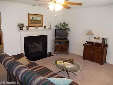 Living Room. Home opens to living room complete with gas logs.