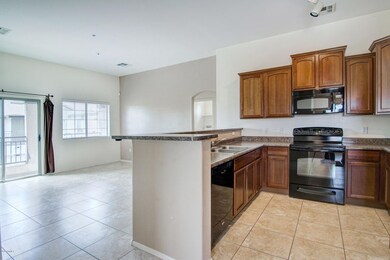 Kitchen opens up to Living Room