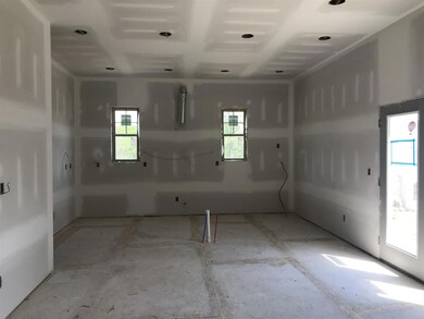 Kitchen from the living room. This is the actual house under construction