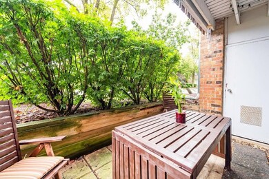 Garden Patio with door to Furnace room.