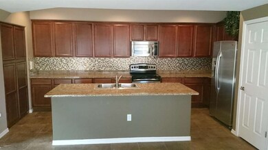 3935 E Rough Rider Rd, Island Kitchen