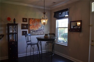 Dining room featuring hardwood floors and 9' ceili