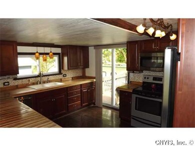 Kitchen. New kitchen with cherry countertop, stain