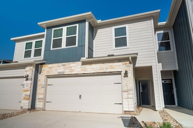 Multi unit property featuring an attached garage,