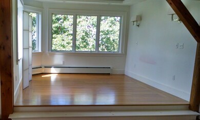 As if nestled in the trees, the master bedroom tak