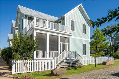 Low-maintenance front yard with a darling white pi
