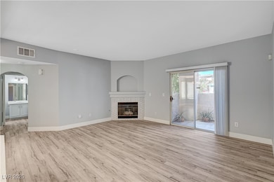 Unfurnished living room with wood finished floors,