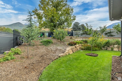 View of fenced backyard