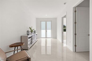 Hall featuring french doors