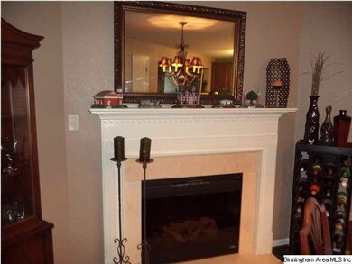 Marble fireplace in the dining room.