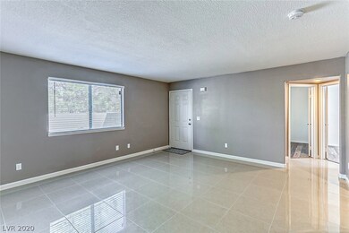 Entry into Living Room with new ceramic tile and t
