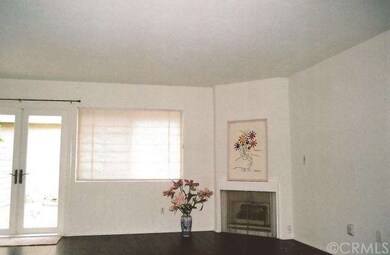 Spacious living room with fireplace; newer double 